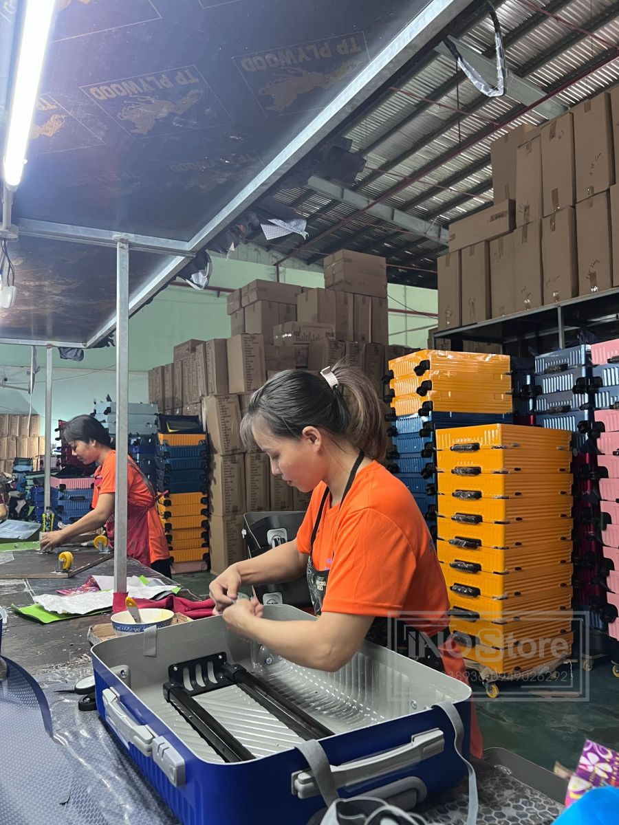 Xưởng sản xuất quà tặng Tết in logo, giá tốt cho chương trình cuối năm